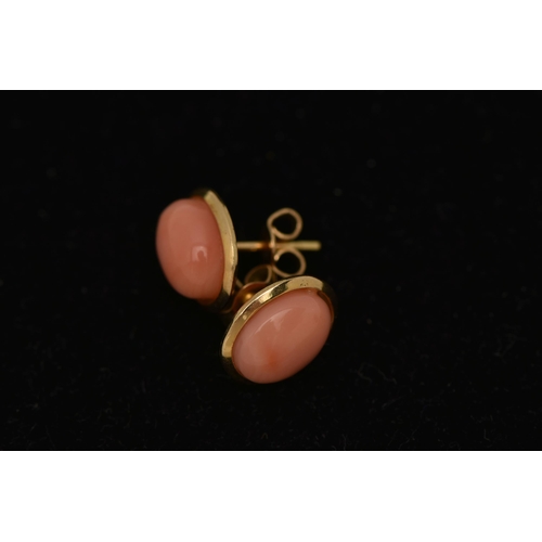19 - A PAIR OF ITALIAN CORAL EARRINGS, oval cabochon coral set in yellow metal, approximate length 11mm, ... 
