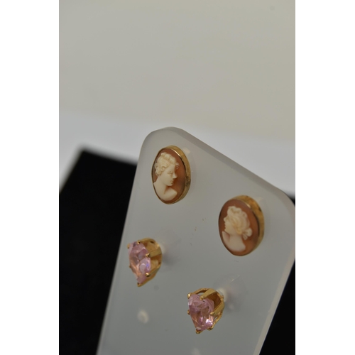 21 - TWO PAIRS OF EARRINGS, the first a pair of yellow metal shell cameo earrings, fitted with post and s... 