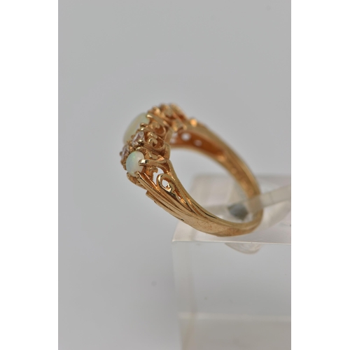 24 - A 9CT GOLD GEM SET RING, three round opals, prong set in yellow gold, accented with one circular cut... 