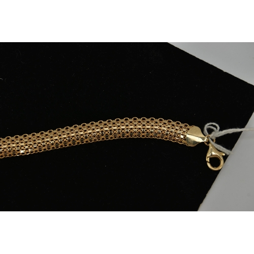 29 - A 9CT GOLD BRACELET, a mesh style bracelet, fitted with a lobster clasp and extender chain, approxim... 