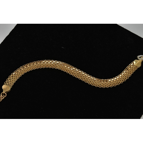 29 - A 9CT GOLD BRACELET, a mesh style bracelet, fitted with a lobster clasp and extender chain, approxim... 