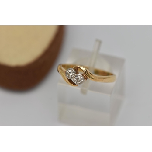 32 - A DIAMOND CROSSOVER RING, designed as two old cut diamonds in millegrain setting to the crossover ba... 