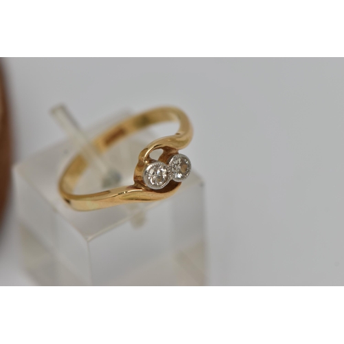 32 - A DIAMOND CROSSOVER RING, designed as two old cut diamonds in millegrain setting to the crossover ba... 