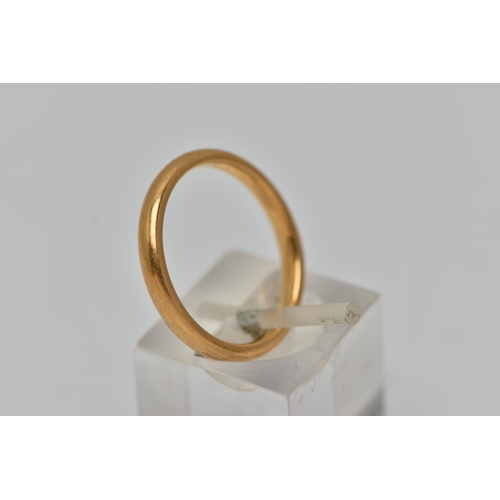 35 - A BAND RING, of plain design, stamped 22ct, ring size N 1/2, approximate weight 4.2 grams (condition... 