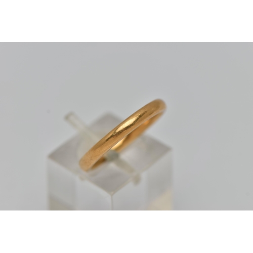 35 - A BAND RING, of plain design, stamped 22ct, ring size N 1/2, approximate weight 4.2 grams (condition... 