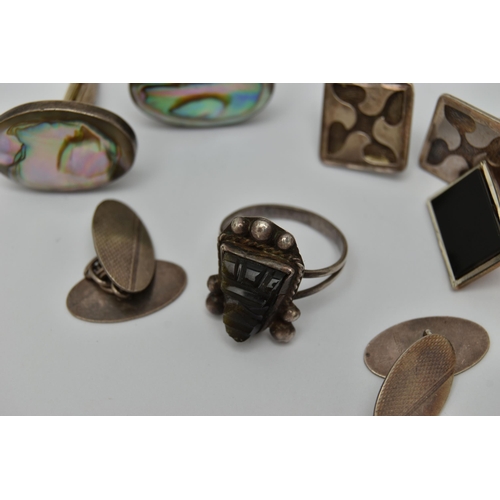 50 - AN ASSORTMENT OF CUFFLINKS, to include a pair of silver cufflinks, hallmarked Birmingham, approximat... 