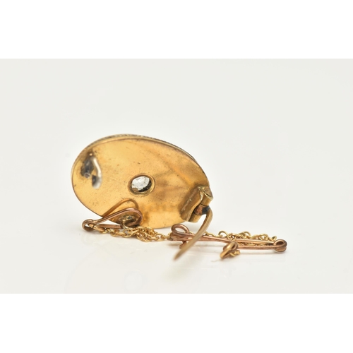 64 - A VICTORIAN YELLOW METAL DIAMOND AND PEARL BROOCH, of an oval form, set to the centre with an old cu... 