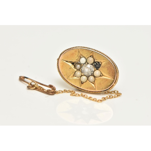 64 - A VICTORIAN YELLOW METAL DIAMOND AND PEARL BROOCH, of an oval form, set to the centre with an old cu... 