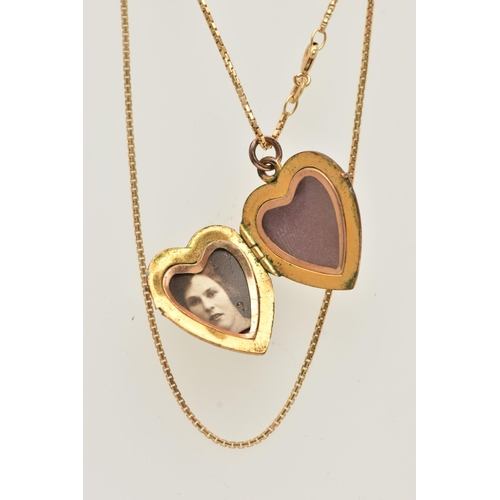 65 - A 9CT GOLD BOX LINK CHAIN AND A GOLD PLATED HEART LOCKET PENDANT, the chain fitted with a spring cla... 