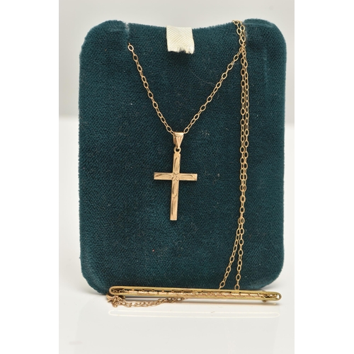 66 - A 9CT GOLD CROSS PENDANT WITH A YELLOW METAL CHAIN, AND A YELLOW METAL BAR BROOCH, the detailed cros... 