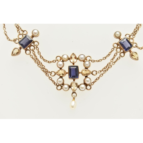 70 - A SILVER GILT GEM SET NECKLACE, the central panel set with a rectangular cut iolite, collet set with... 