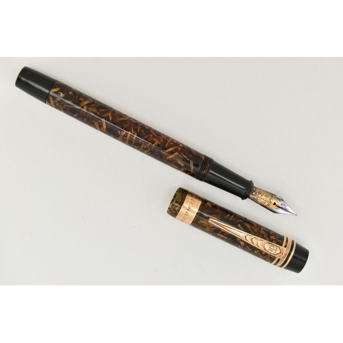 71 - AN 'ONOTO THE PEN' FOUNTAIN PEN, by De Larue & Co Ltd London, translucent brown barrel, fitted with ... 