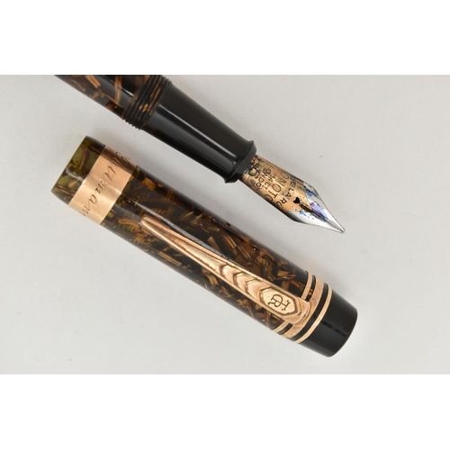 71 - AN 'ONOTO THE PEN' FOUNTAIN PEN, by De Larue & Co Ltd London, translucent brown barrel, fitted with ... 