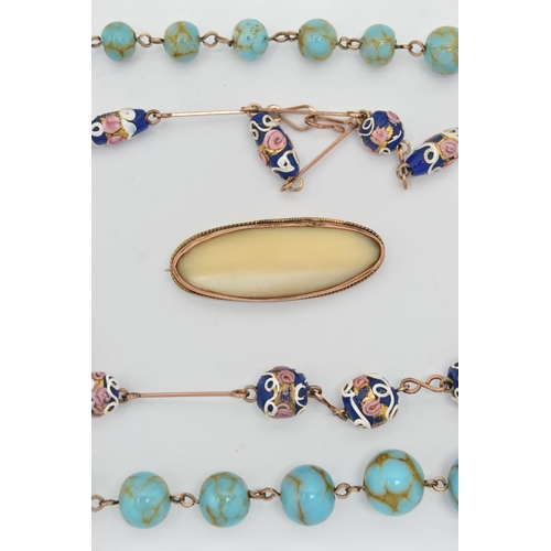 83 - AN EDWARDIAN 9CT YELLOW GOLD MOTHER OF PEARL BROOCH AND TWO BEAD NECKLACES, to include an oval shape... 