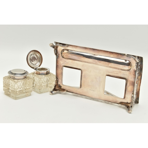 96 - AN EARLY 20TH CENTURY SILVER DESK TOP INK STAND SET, the rectangular ink stand with pierced floral a... 