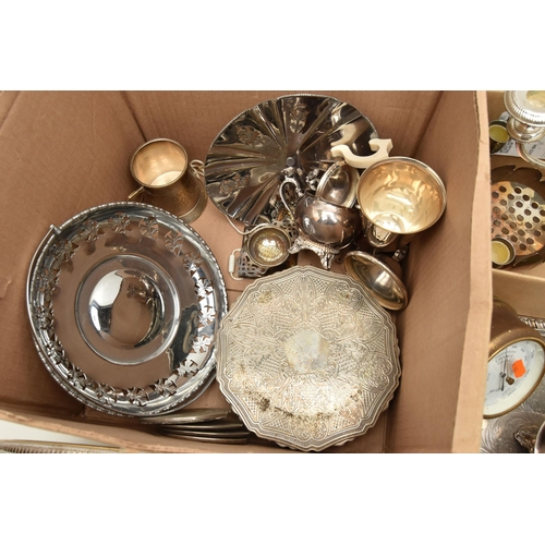 121 - TWO BOXES OF SILVER PLATED WARE, to include a large rectangular tray, an oval tray, placemats, cande... 