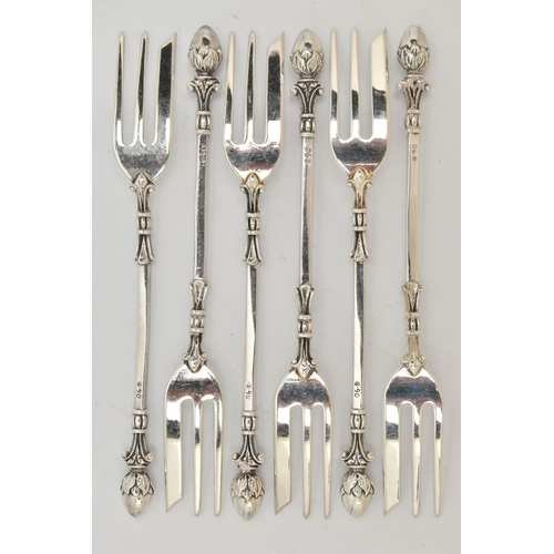 126 - SIX MATCHING CAKE FORKS, with acorn terminals and further tapered scrolling detail, each stamped CW ... 