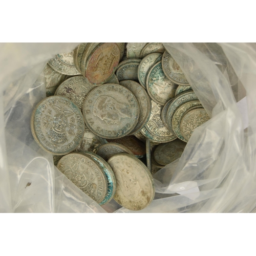 142 - A PLASTIC BAG OF MID 20th CENTURY COINAGE, to include over 4.5 Kilo of Pre 1947 heavily stained and ... 