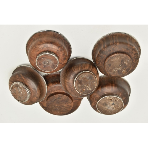 145 - SIX ASSORTED 19TH CENTURY TIBETAN WOODEN BOWLS WITH WHITE METAL LININGS/MOUNTS, largest diameter 12.... 