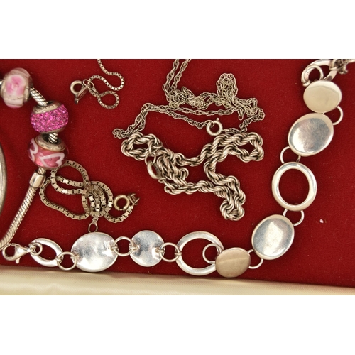 147 - A SELECTION OF SILVER AND WHITE METAL JEWELLERY, to include a large textured silver cross pendant, h... 