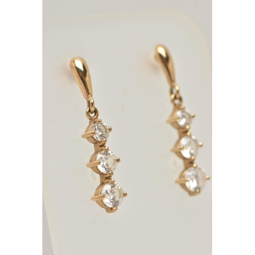 148 - A PAIR OF YELLOW METAL CUBIC ZIRCONIA DROP EARRINGS, designed as a row of three graduated colourless... 