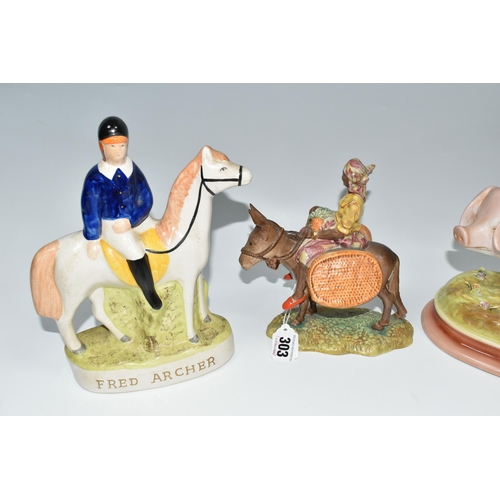 303 - A GROUP OF ANIMAL THEMED FIGURES, comprising a Beswick 'Susie Jamaica' 1347, a flatback Staffordshir... 