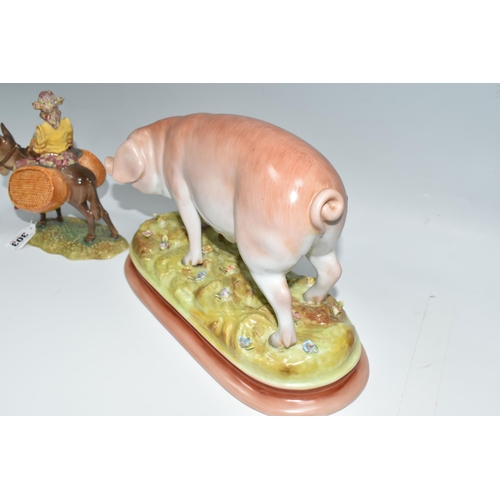 303 - A GROUP OF ANIMAL THEMED FIGURES, comprising a Beswick 'Susie Jamaica' 1347, a flatback Staffordshir... 