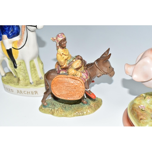 303 - A GROUP OF ANIMAL THEMED FIGURES, comprising a Beswick 'Susie Jamaica' 1347, a flatback Staffordshir... 