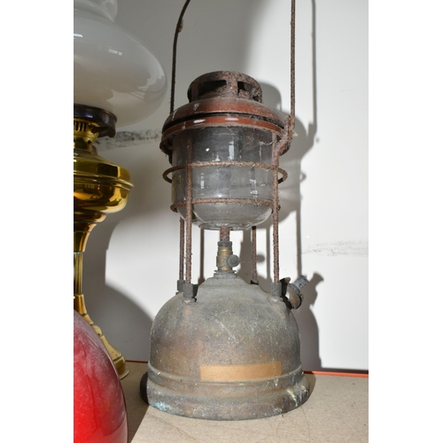 328 - A GROUP OF LAMPS, comprising a No.21 miner's lamp type 6 Protector Lamp & Lighting Co. Ltd., three b... 