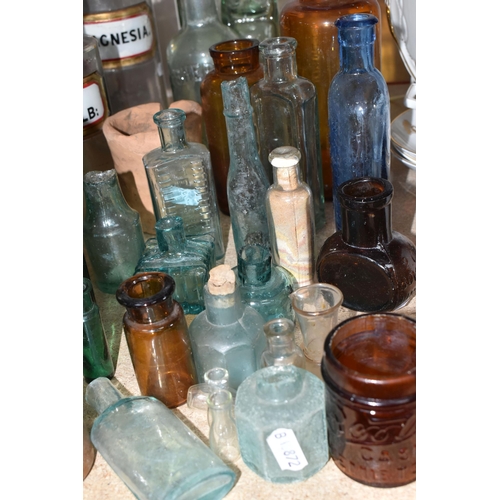 331 - A GROUP OF VICTORIAN APOTHECARY BOTTLES, comprising a clear glass jar labelled 'Magnesia', height 25... 