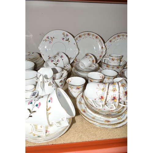 332 - A LARGE GROUP OF LATE 19TH/EARLY 20TH CENTURY TEAWARE, an unmarked tea set decorated pink, green and... 