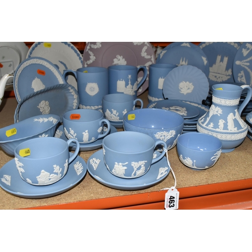 463 - A LARGE COLLECTION OF WEDGWOOD BLUE JASPERWARE, comprising a large sugar bowl (scratches and black m... 