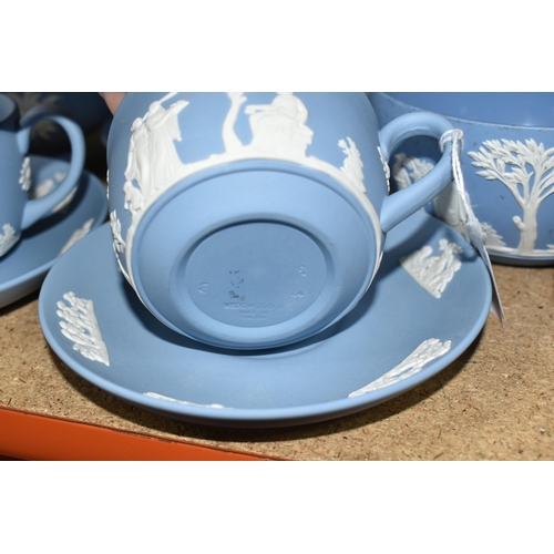 463 - A LARGE COLLECTION OF WEDGWOOD BLUE JASPERWARE, comprising a large sugar bowl (scratches and black m... 