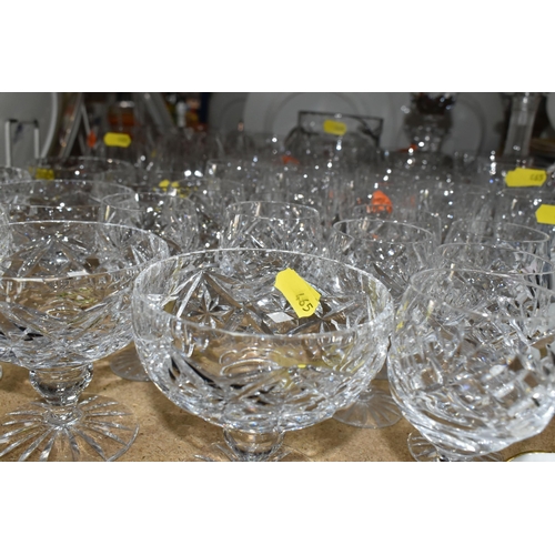 465 - A GROUP OF CUT GLASS, comprising a set of six Royal Doulton brandy glasses, five unmarked wine glass... 