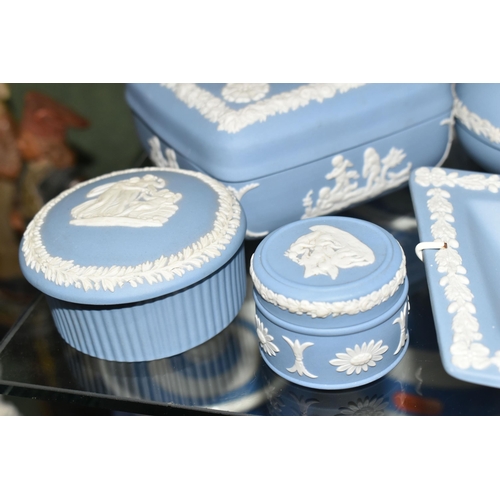 352 - A COLLECTION OF WEDGWOOD PALE BLUE JASPERWARE, over fifty pieces to include vases, tallest 13cm, tab... 