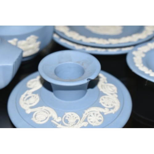 352 - A COLLECTION OF WEDGWOOD PALE BLUE JASPERWARE, over fifty pieces to include vases, tallest 13cm, tab... 