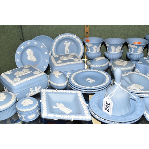 352 - A COLLECTION OF WEDGWOOD PALE BLUE JASPERWARE, over fifty pieces to include vases, tallest 13cm, tab... 