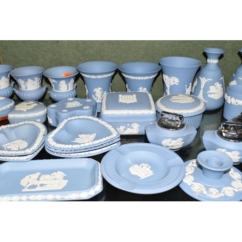 352 - A COLLECTION OF WEDGWOOD PALE BLUE JASPERWARE, over fifty pieces to include vases, tallest 13cm, tab... 