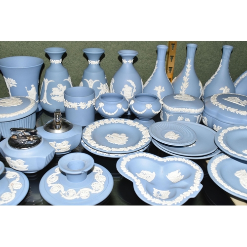 352 - A COLLECTION OF WEDGWOOD PALE BLUE JASPERWARE, over fifty pieces to include vases, tallest 13cm, tab... 