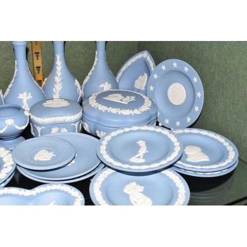 352 - A COLLECTION OF WEDGWOOD PALE BLUE JASPERWARE, over fifty pieces to include vases, tallest 13cm, tab... 