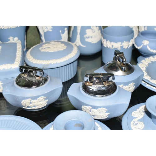 352 - A COLLECTION OF WEDGWOOD PALE BLUE JASPERWARE, over fifty pieces to include vases, tallest 13cm, tab... 