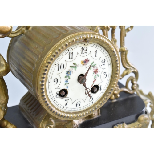 375 - TWO FRENCH MANTEL CLOCKS, comprising an eight day Ormolu clock with pendulum and key, height 39cm, t... 