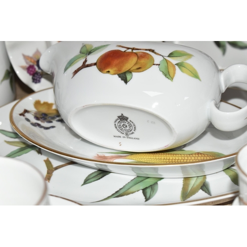 377 - A QUANTITY OF ROYAL WORCESTER 'EVESHAM' PATTERN DINNERWARE, comprising a large centrepiece bowl, dia... 