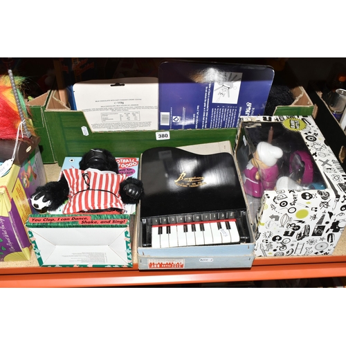 380 - TWO BOXES AND LOOSE TOYS AND GAMES, to include a boxed 'Baby Bebe' baby piano, a boxed Football Gogo... 