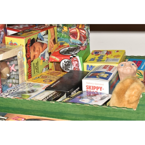 380 - TWO BOXES AND LOOSE TOYS AND GAMES, to include a boxed 'Baby Bebe' baby piano, a boxed Football Gogo... 