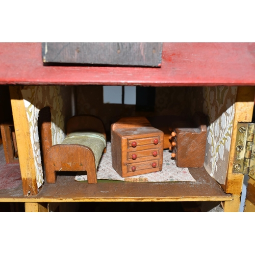 386 - A SCRATCHBUILT SMALL SCALE WOODEN DOLLS HOUSE, c.1950s, modelled as a half-timbered house, front ope... 