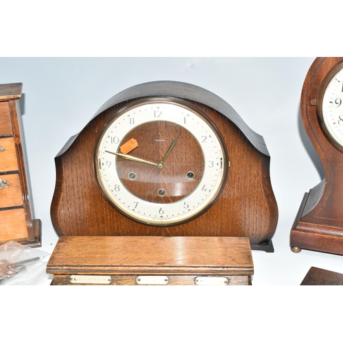 388 - A GROUP OF CLOCKS AND TREEN, comprising two wooden cased mantel clocks, a seven drawer spice rack, h... 