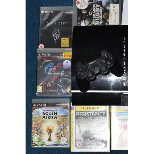 412 - A PLAYSTATION 3 CONSOLE AND GAMES, games include Resistance Fall Of Man, Resistance 3, Gran Turismo ... 