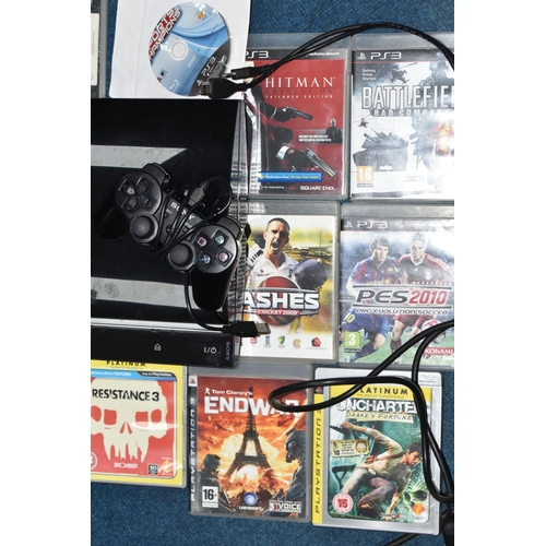 412 - A PLAYSTATION 3 CONSOLE AND GAMES, games include Resistance Fall Of Man, Resistance 3, Gran Turismo ... 