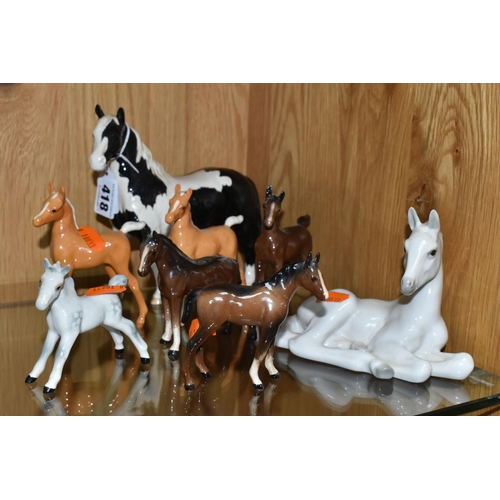 418 - A GROUP OF MAINLY BESWICK HORSE FIGURES, comprising Pinto Pony no 1373 - Second Version (tiny chips ... 